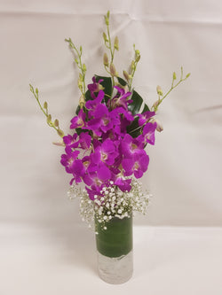 Vibrant Singapore Orchids in Glass Vase