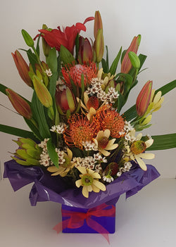 Natives with Asiatic/Tiger Lilies in Boxed Arrangement